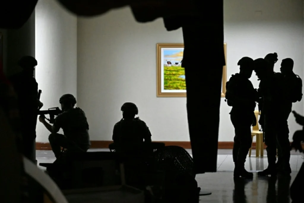 Police say man detained after gunfire inside Philippine senate