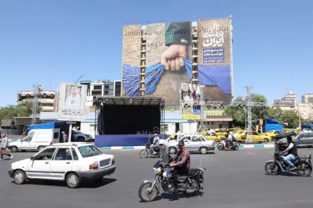 As delegations gather in Qatar for talks, US claims attacks on targets in southern Iran